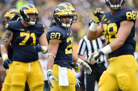 Ben Braden (71), Drake Johnson (20), and Jake Butt (88)