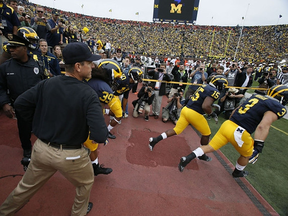 Jim Harbaugh, Sione Houma (39), James Ross (15), and Desmond Morgan (3)