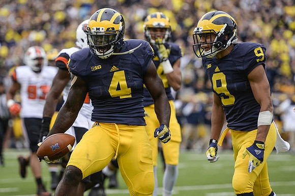 De'Veon Smith (4) and Grant Perry (9)