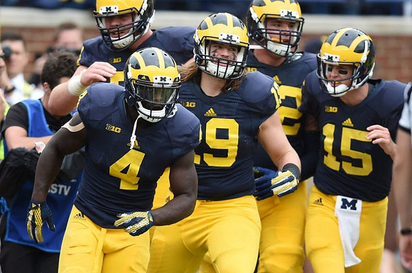 De'Veon Smith (4), Henry Poggi (19), and Jake Rudock (15)