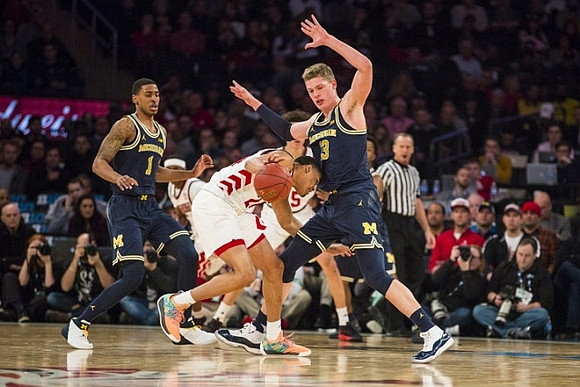 Charles Matthews (1) and Zavier Simpson (3)