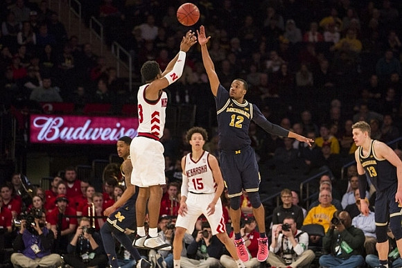 Charles Matthews (1), Muhammad-Ali Abdur-Rahkman (12), and Moritz Wagner (13)