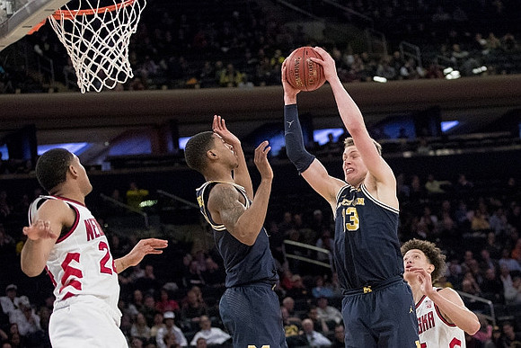 Charles Matthews (1) and Moritz Wagner (13)
