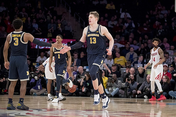 Zavier Simpson (3), Charles Matthews (1), and Moritz Wagner (13)
