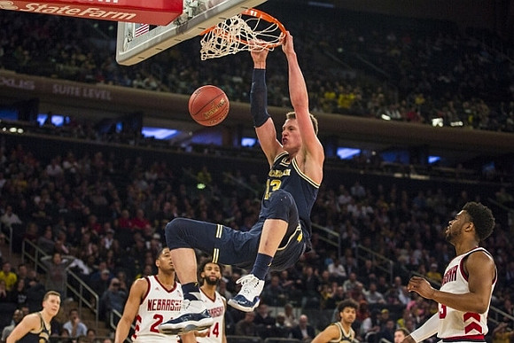 Moritz Wagner (13), Duncan Robinson (22), and Ibi Watson (23)