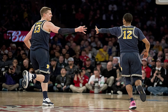 Moritz Wagner (13) and Muhammad-Ali Abdur-Rahkman (12)