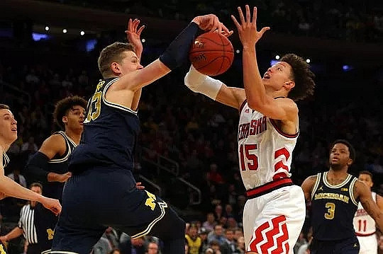 Duncan Robinson (22), Jordan Poole (2), Moritz Wagner (13), and Zavier Simpson (3)