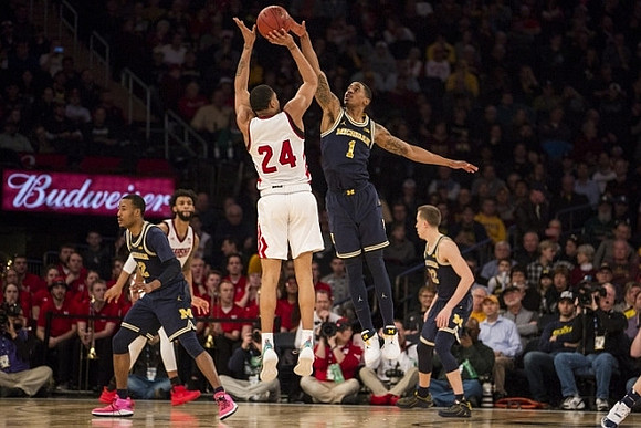 Muhammad-Ali Abdur-Rahkman (12), Charles Matthews (1), and Duncan Robinson (22)