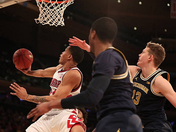 Muhammad-Ali Abdur-Rahkman (12) and Moritz Wagner (13)