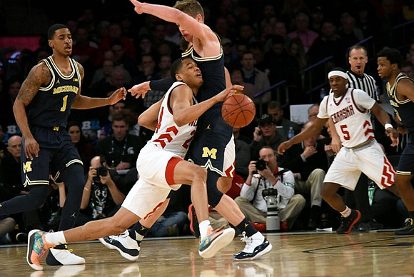 Charles Matthews (1), Moritz Wagner (13), and Zavier Simpson (3)