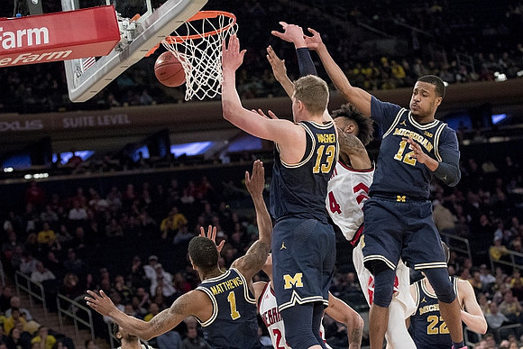 Charles Matthews (1), Moritz Wagner (13), Muhammad-Ali Abdur-Rahkman (12), and Duncan Robinson (22)