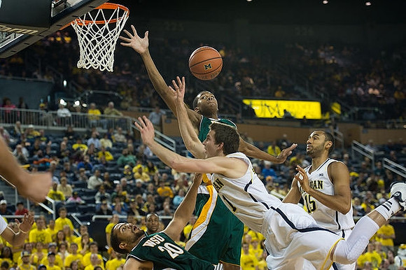 Nik Stauskas (11) and Jon Horford (15)
