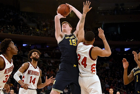 Jon Teske (15) and Charles Matthews (1)