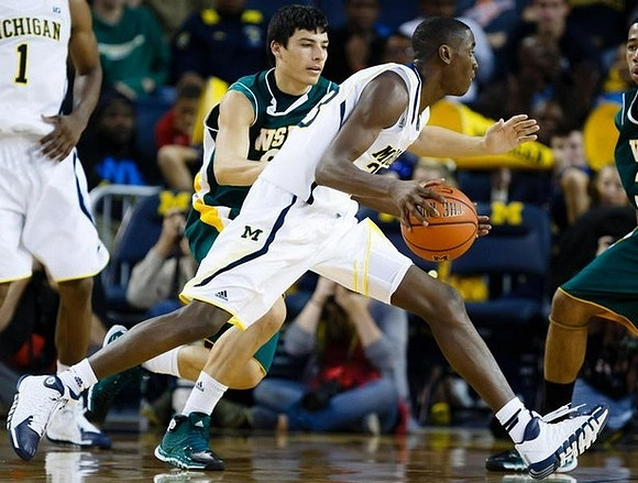 Glenn Robinson III (1) and Caris LeVert (23)