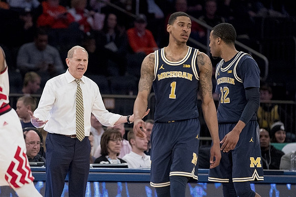 John Beilein, Charles Matthews (1), and Muhammad-Ali Abdur-Rahkman (12)