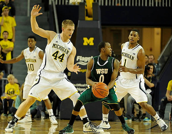 Derrick Walton Jr. (10), Max Bielfeldt (44), and Glenn Robinson III (1)