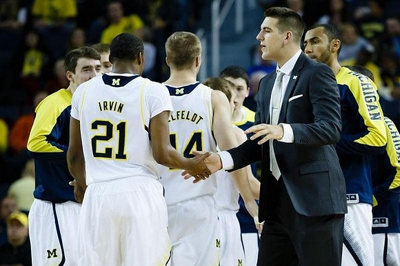 Cole McConnell (12), Zak Irvin (21), Max Bielfeldt (44), Mitch McGary (4), and Jon Horford (15)