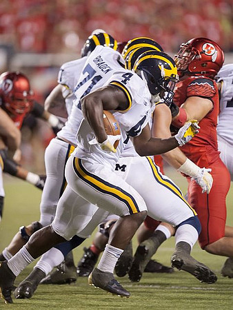 De'Veon Smith (4) and Ben Braden (71)