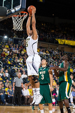 Jordan Morgan (52) and Nik Stauskas (11)