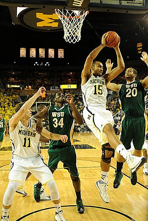 Nik Stauskas (11) and Jon Horford (15)