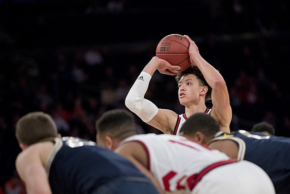 Duncan Robinson (22) and Charles Matthews (1)