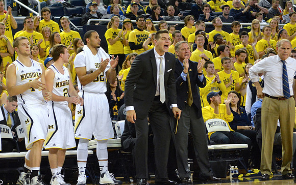 Max Bielfeldt (44), Spike Albrecht (2), Jordan Morgan (52), Mitch McGary (4), Jeff Meyer, and John Beilein