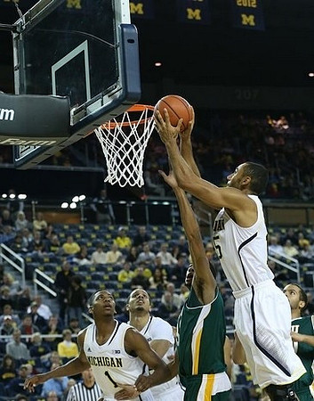 Jon Horford (15), Glenn Robinson III (1), and Jordan Morgan (52)