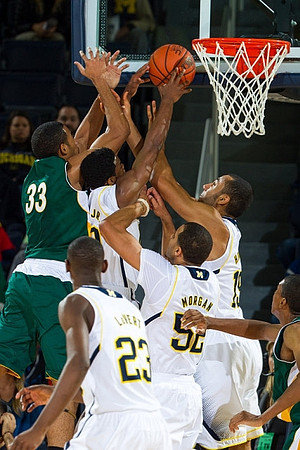 Derrick Walton Jr. (10), Caris LeVert (23), Jordan Morgan (52), and Jon Horford (15)