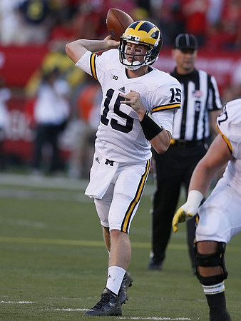 Jake Rudock (15) and Kyle Kalis (67)