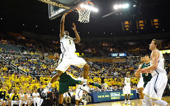 Glenn Robinson III (1), Nik Stauskas (11), and Caris LeVert (23)
