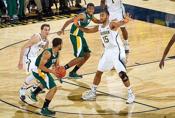 Nik Stauskas (11) and Jon Horford (15)