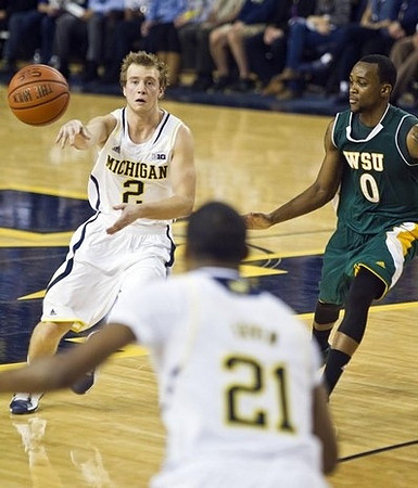 Spike Albrecht (2) and Zak Irvin (21)