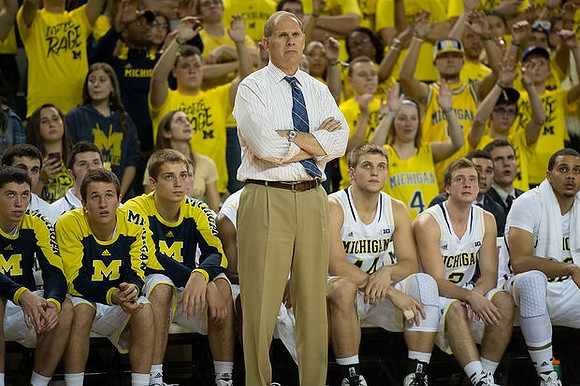 John Beilein, Cole McConnell (12), Andrew Dakich (5), Mark Donnal (34), Max Bielfeldt (44), Spike Albrecht (2), and Jordan Morgan (52)