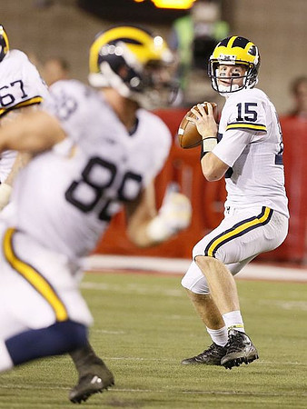 Kyle Kalis (67), Jake Butt (88), and Jake Rudock (15)