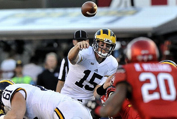 Graham Glasgow (61) and Jake Rudock (15)