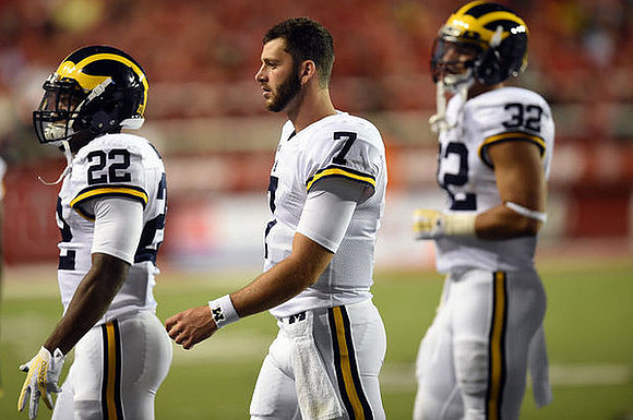 Jarrod Wilson (22), Shane Morris (7), and Ty Isaac (32)