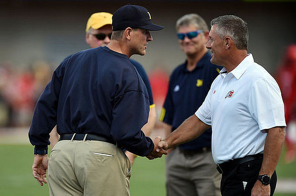 Jim Harbaugh and Utah Head Coach Kyle Whittingham