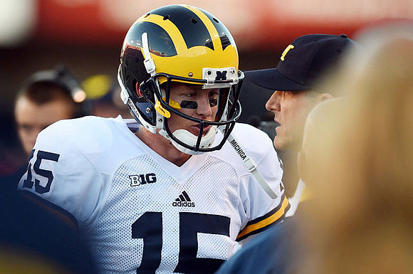 Jake Rudock (15) and Jim Harbaugh