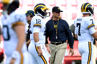 Alex Malzone (12), Jim Harbaugh, and Shane Morris (7)