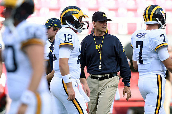 Alex Malzone (12), Jim Harbaugh, and Shane Morris (7)