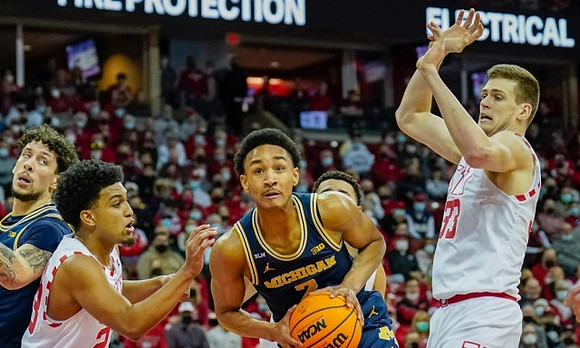 Kobe Bufkin (2) and Brandon Johns Jr. (23)