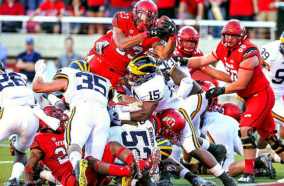 Jourdan Lewis (26), Joe Bolden (35), Royce Jenkins-Stone (52), James Ross (15), and Matthew Godin (99)