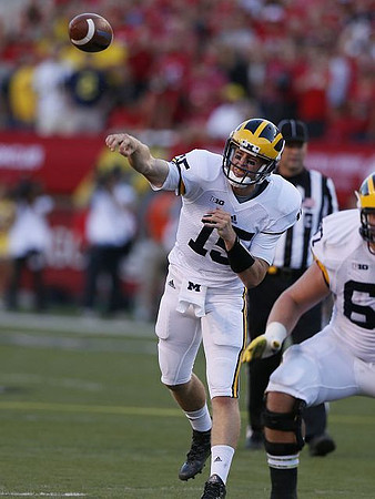 Jake Rudock (15) and Kyle Kalis (67)