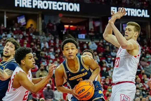 Kobe Bufkin (2) and Brandon Johns Jr. (23)