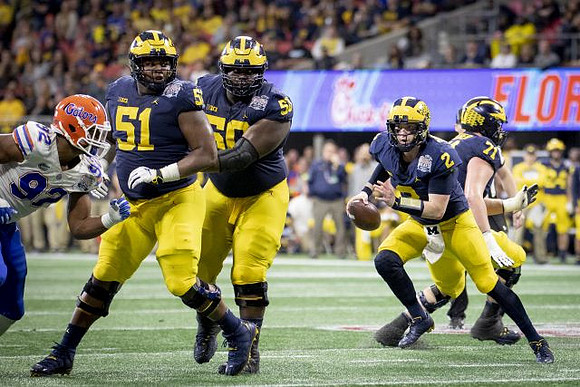 Cesar Ruiz (51), Michael Onwenu (50), Shea Patterson (2), and Andrew Stueber (71)