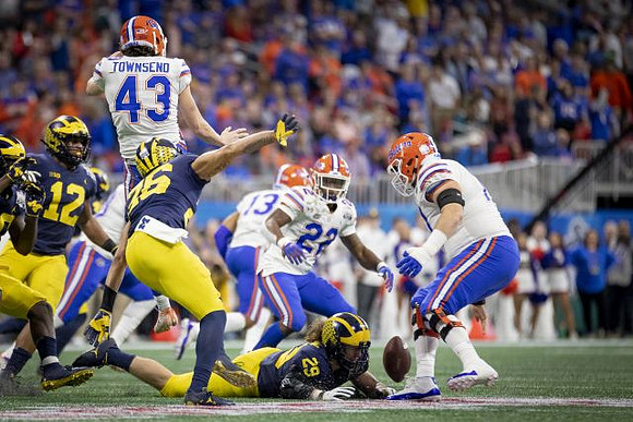 Josh Ross (12), J'Marick Woods (26), and Jordan Glasgow (29)