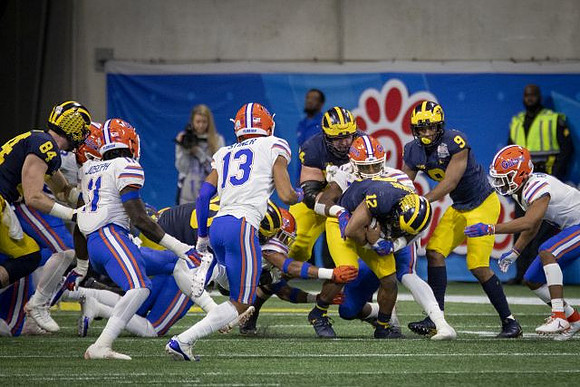 Sean McKeon (84), Michael Onwenu (50), Ben Bredeson (74), Chris Evans (12), and Donovan Peoples-Jones (9)