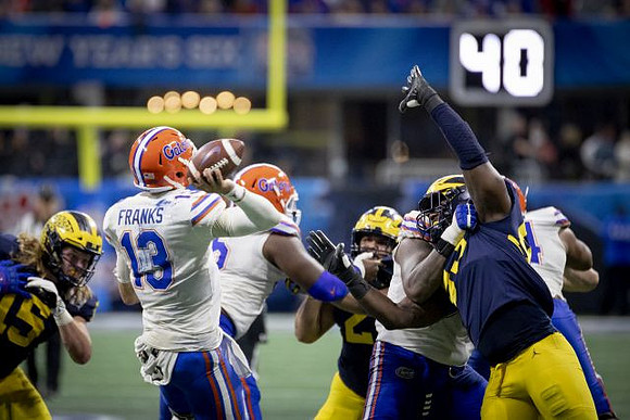 Chase Winovich (15), Carlo Kemp (2), and Lawrence Marshall (93)