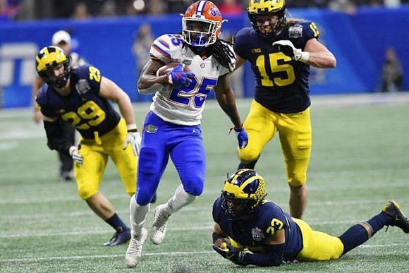 Jordan Glasgow (29), Tyree Kinnel (23), and Chase Winovich (15)