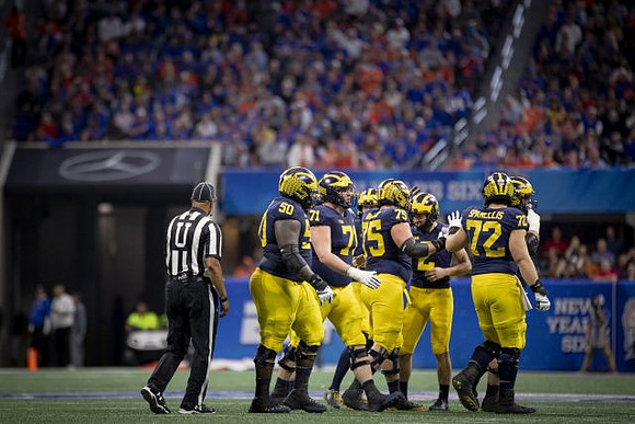 Michael Onwenu (50), Andrew Stueber (71), Jon Runyan Jr. (75), Shea Patterson (2), and Stephen Spanellis (72)